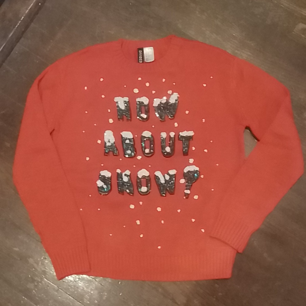 H & M Holiday sweater in bright red with green/white/black sequins. Size XS.